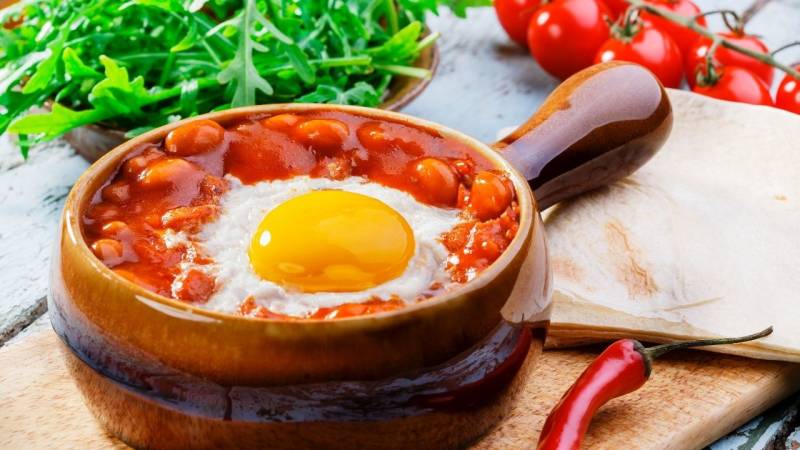 Baked Beans with fried egg is a hearty breakfast