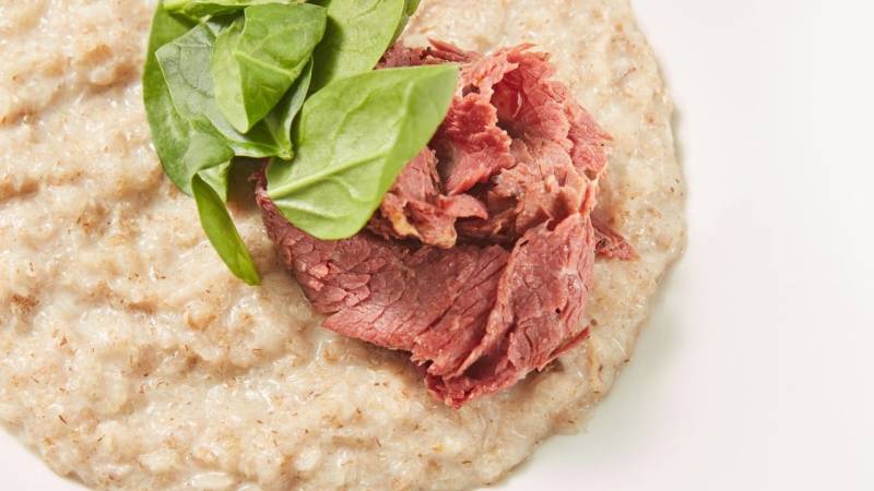 Oatmeal can also be hearty and savory with ham and cheese