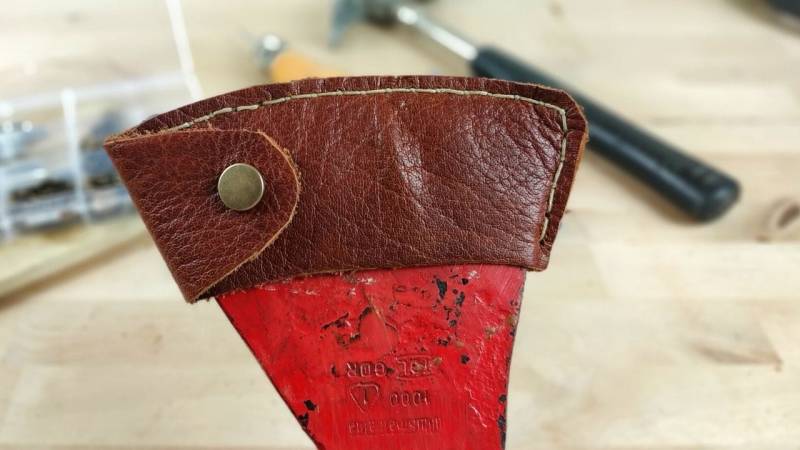 The finished leather sheath for your axe