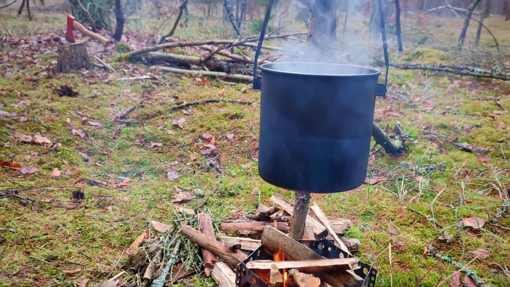 The Billy Can tends to get sooty on an open fire, so bring an extra bag to keep your backpack clean