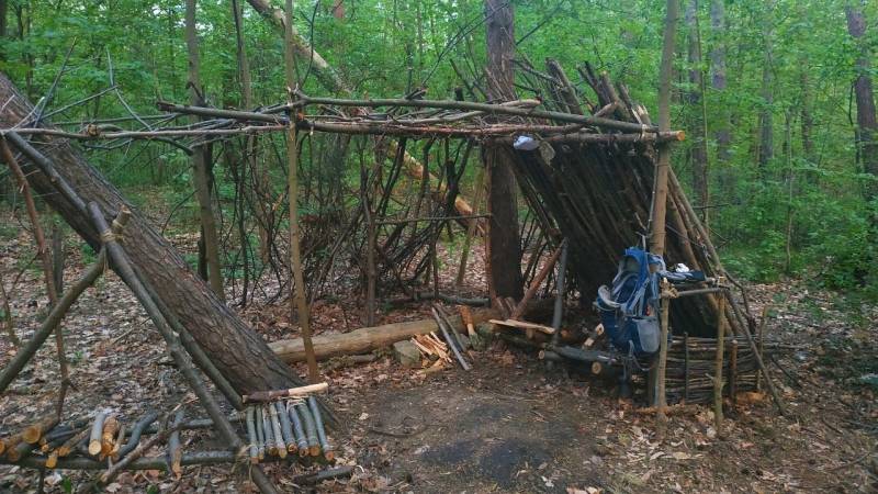 Bushcrafting is a form of outdoor living that includes skills such as utilizing natural resources, building shelters, and cooking.