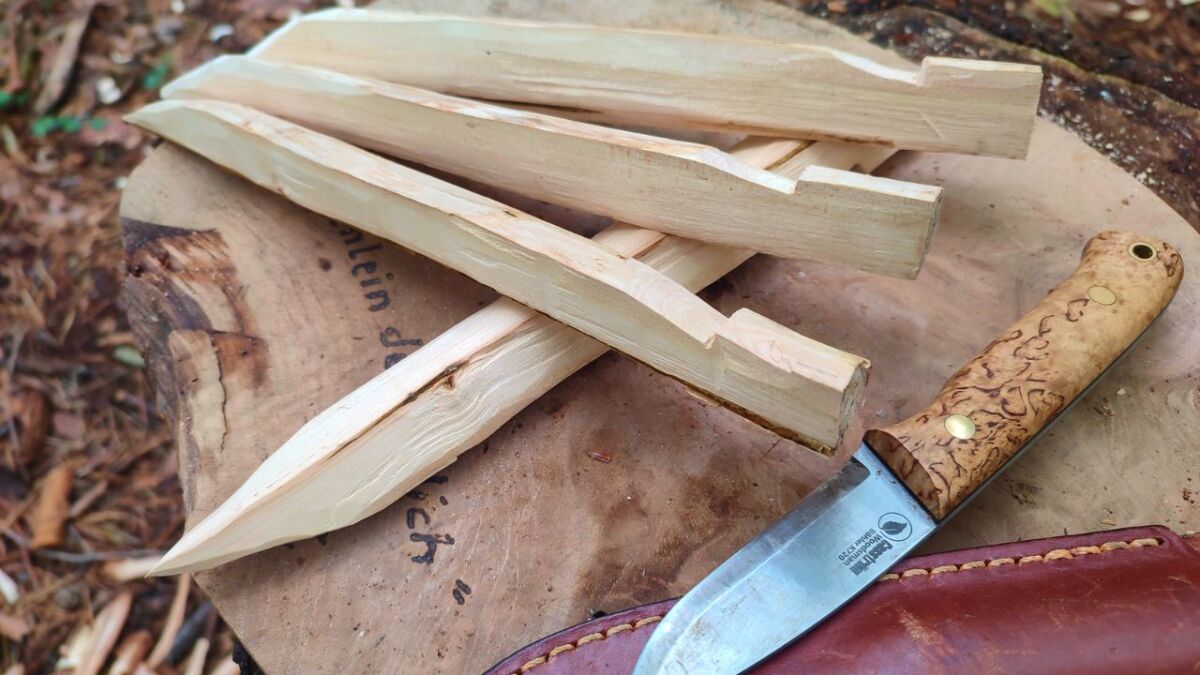 This could be a beginner's project in bushcrafting: Carve sturdy tent pegs