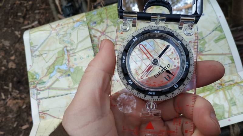 A Suunto brand compass, globally usable