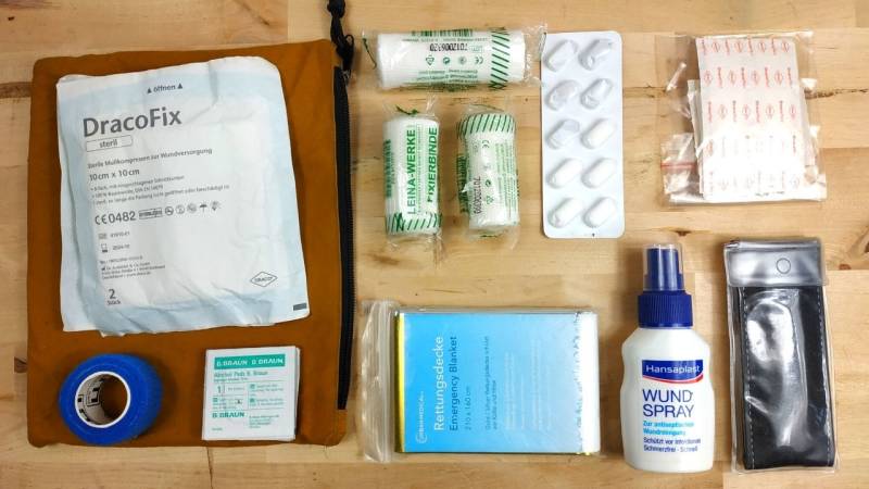 Some utensils that belong in a first aid kit