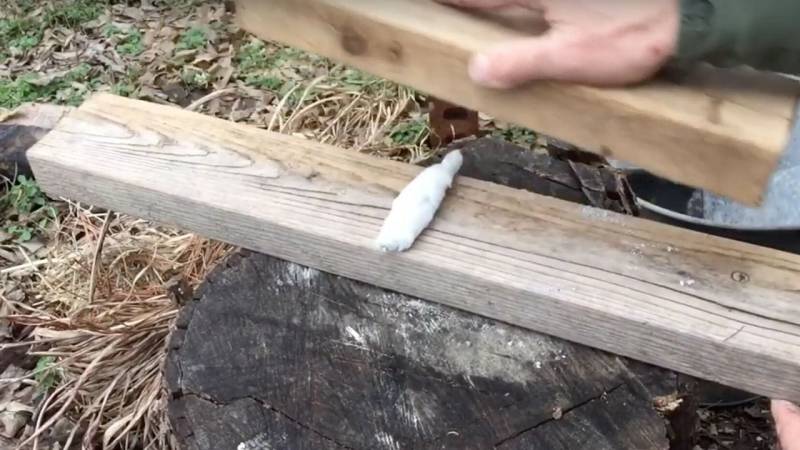 Starting a fire with a tampon and some ash