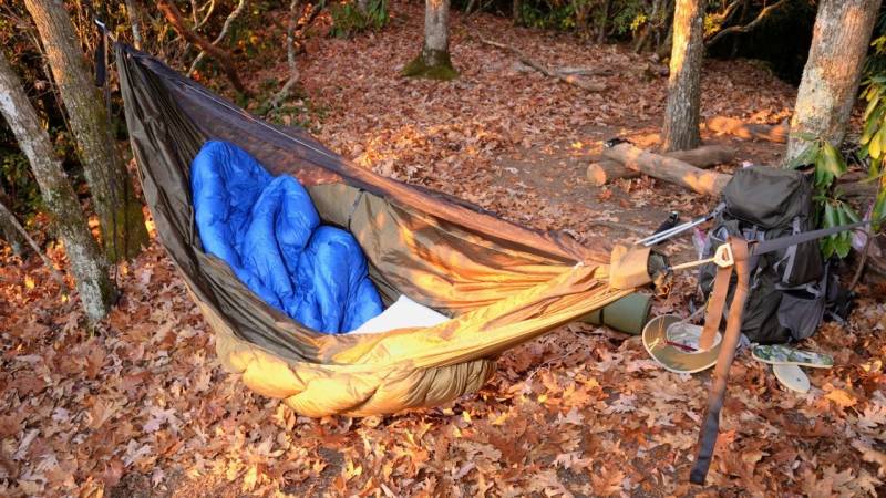 Invest in a good sleeping bag if you sleep in a hammock during cold seasons