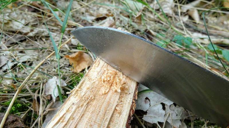 Scraping wood shavings for tinder