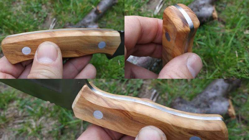 The handle is made of olive wood and cleanly processed