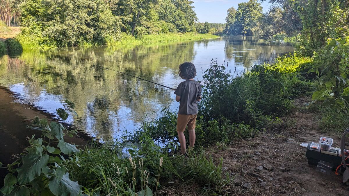 child fishing