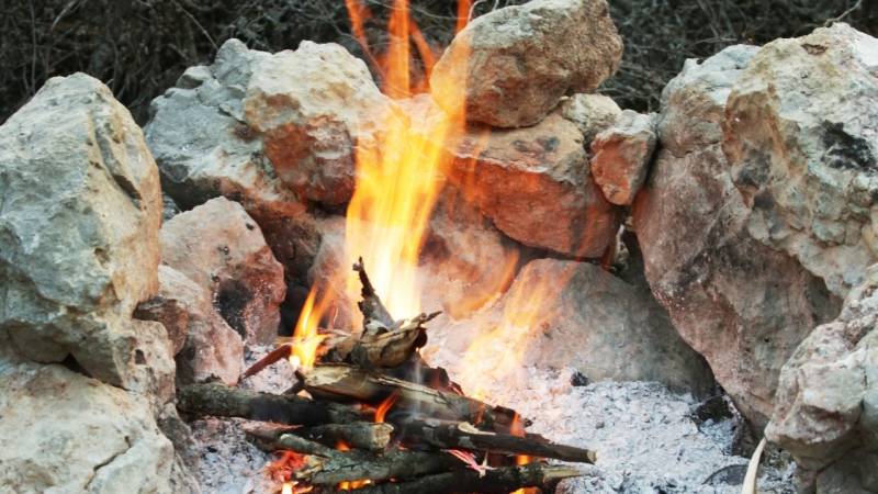 Keep your tent and sleeping area warm with hot stones from your campfire