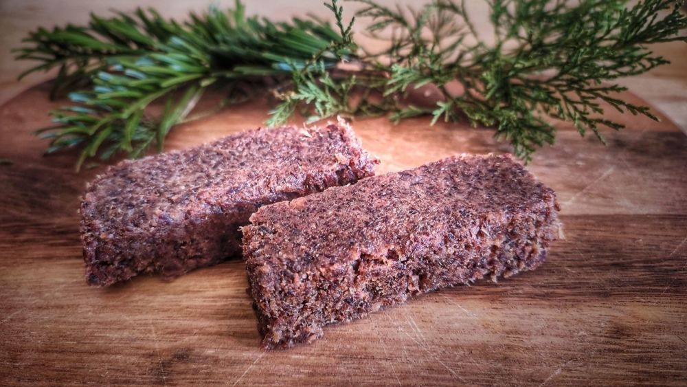 Pemmican consists of dried meat and fat and sometimes berries. The meat is usually bison or beef but can also be elk or deer. The berries can be blackberries, blueberries, chokeberries or strawberries.