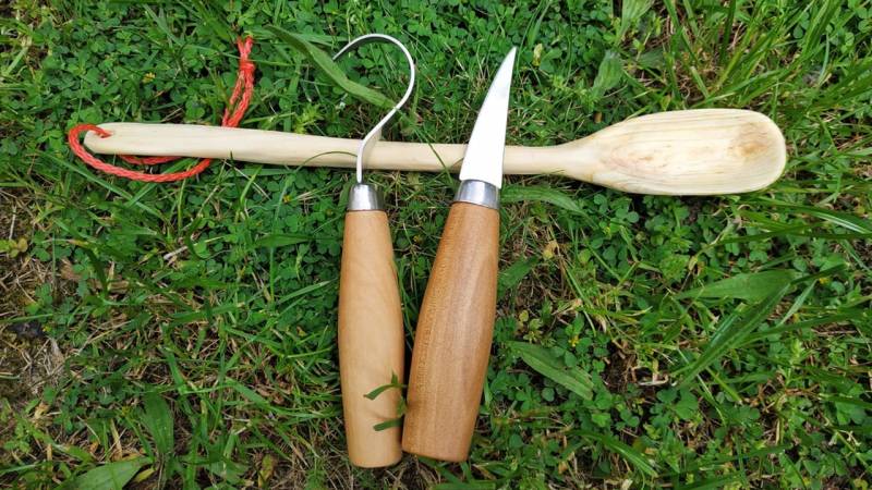 You should be able to carve spoons with the bushcraft knife