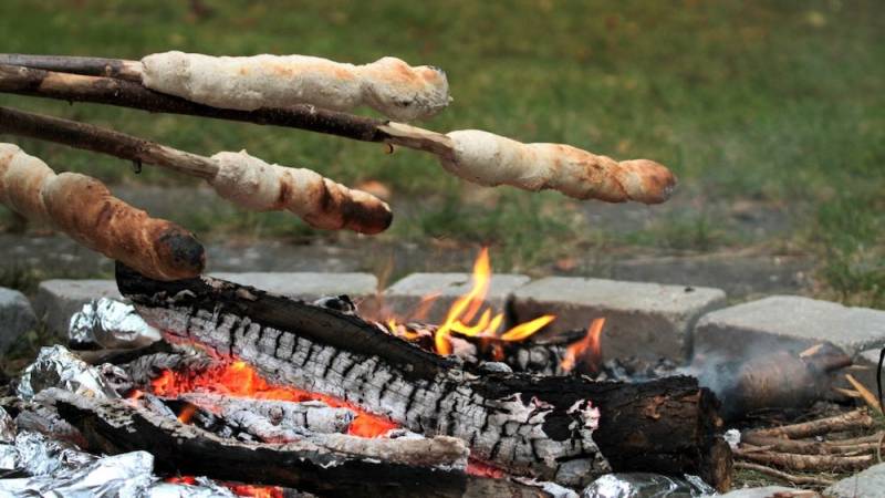 Stock bread over campfire