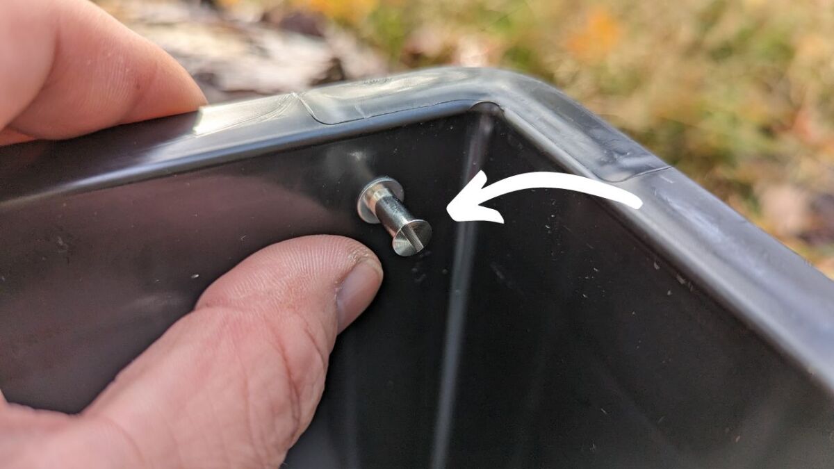 Attaching screws to Boxio separating toilet