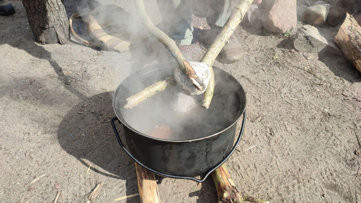 Boiling water with stones