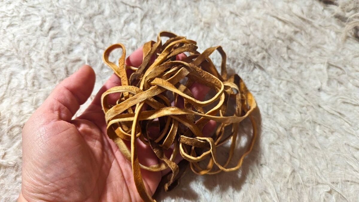 Individual strips of suede braided into a cord